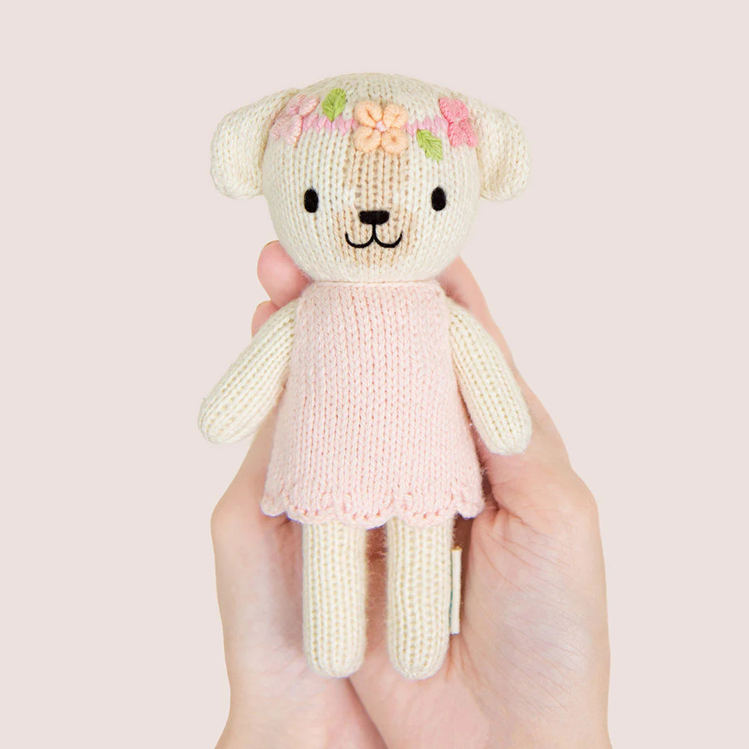 cuddle + kind Hand-Knit Tiny Collection - Charlotte the Dog Size Detail In Hand