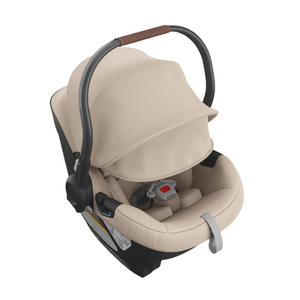 UPPAbaby Aria Infant Car Seat - Declan (Oat Melange/Chestnut Leather) Front Angle Sunshade Down